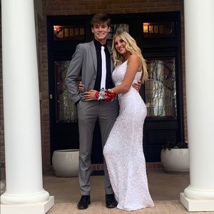 This is a size 6 Prom white sequin dress, worn once, super comfy and fun